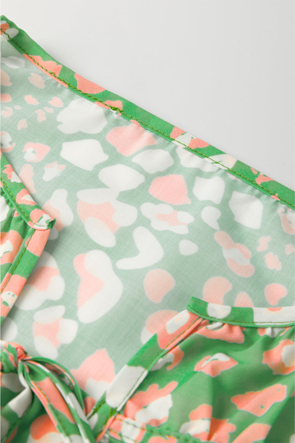 Green Abstract Leopard Tie Front Flutter Sleeve Blouse