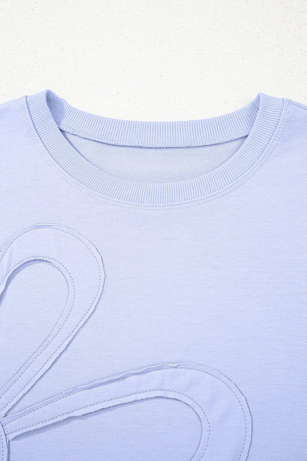 Beau Blue Solid Color Floral Patched Half Sleeve Tunic Top