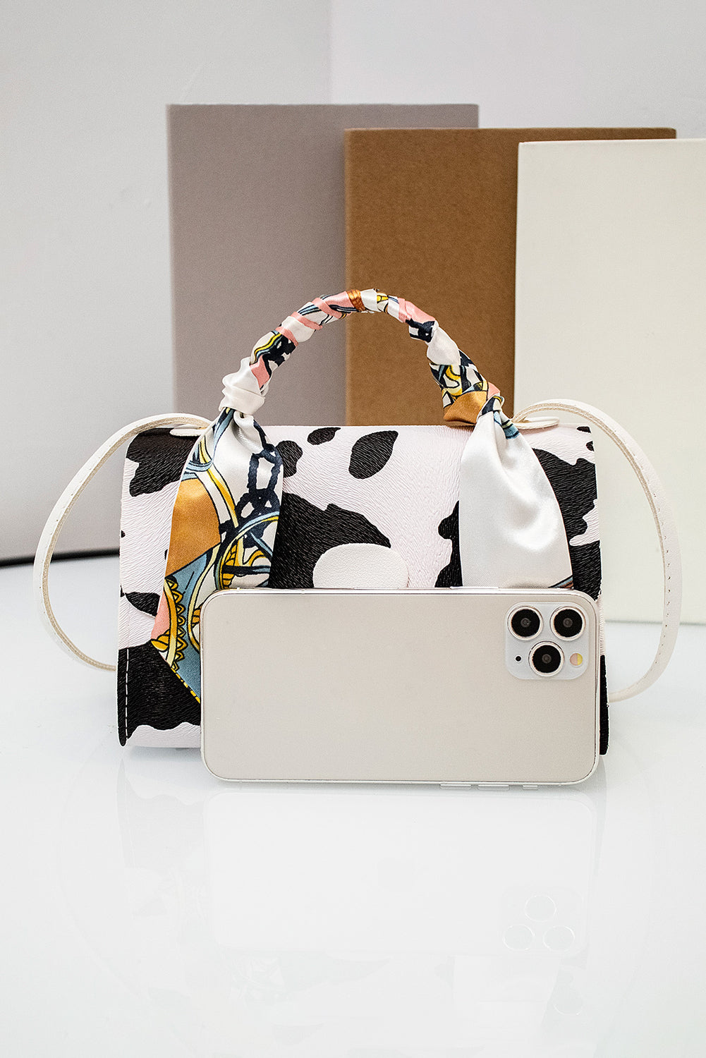 White Cow Pattern Ribbon Decor PU Leather Bag