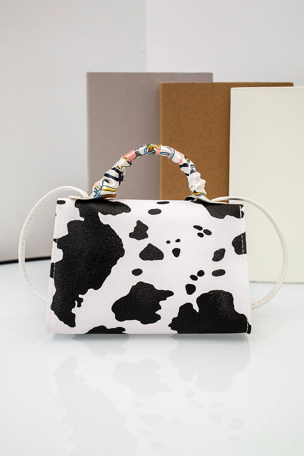 White Cow Pattern Ribbon Decor PU Leather Bag