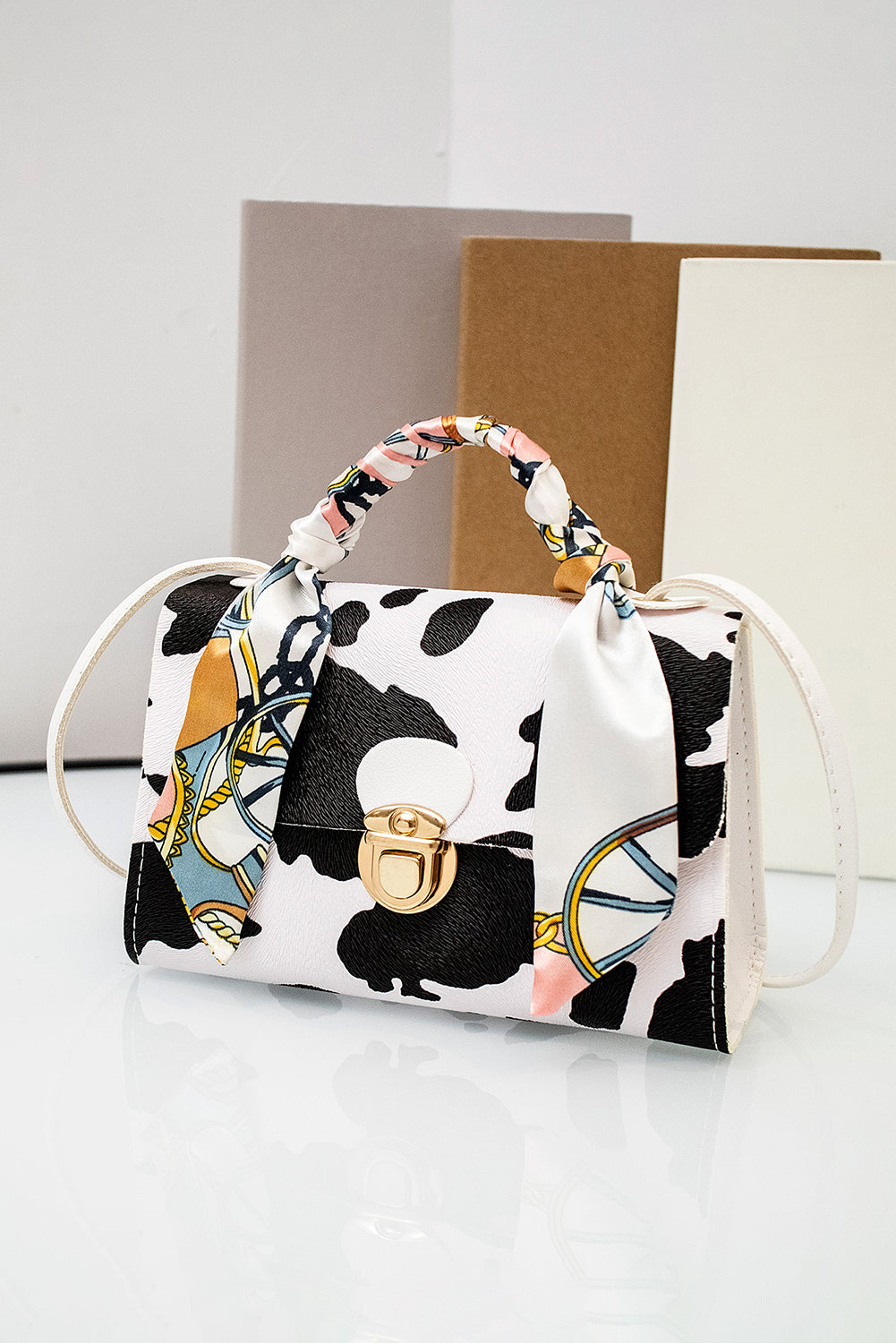 White Cow Pattern Ribbon Decor PU Leather Bag