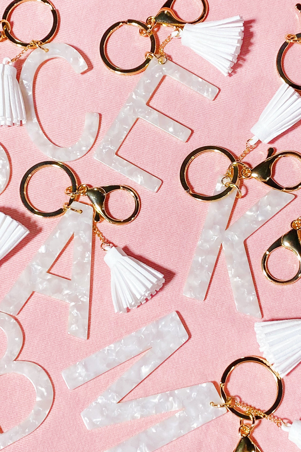 Tasseled Initial Key Chain, White-0