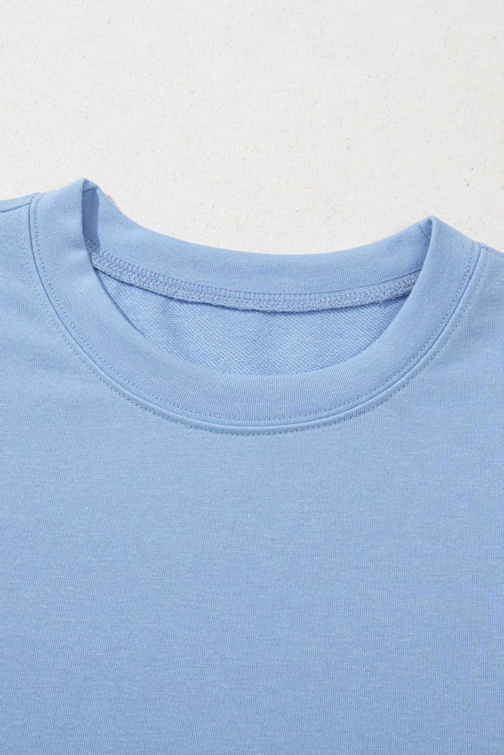 Beau Blue Eyelet Flower Embroidered Crew Neck Blouse